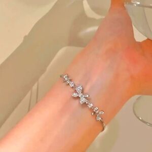 Adjustable drawstring charm bracelet